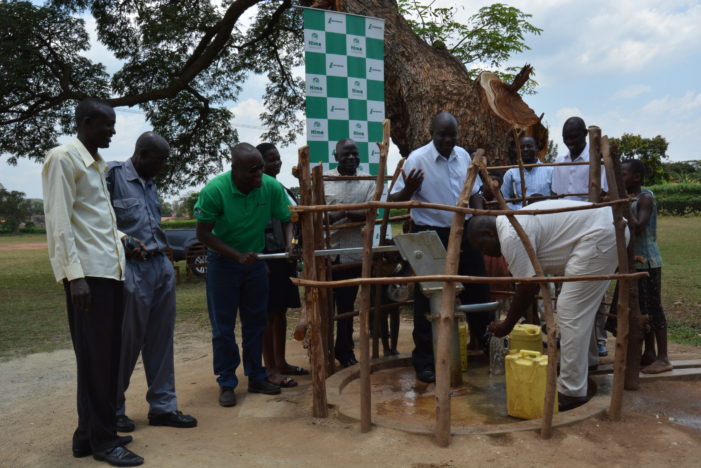 Patrick Waswa of Hima cement with Tororo residents