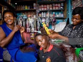 Ugandan women in a hair dressing shop